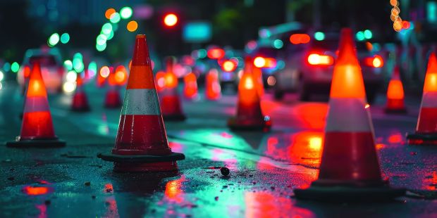 Road cones cautioning evening traffic congestion